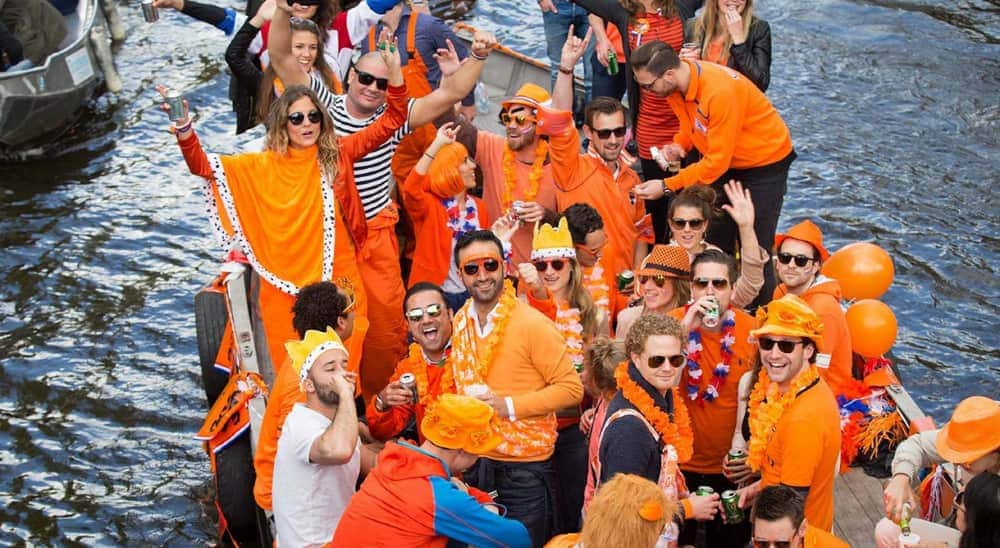 King's Day celebrations from years past in the Netherlands, from Holland.com. 