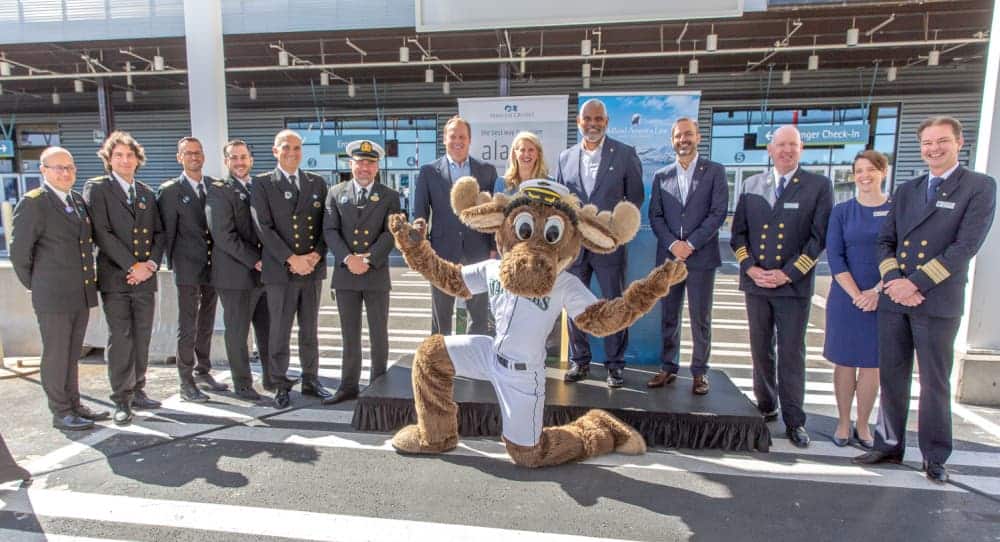 The ship's senior officers with (on stage, from left) Executive Director of Port of Seattle Steve Metruck, Princess Cruises President Jan Swartz, Carnival Corporation President & CEO Arnold Donald and Holland America Line President Gus Antorcha.