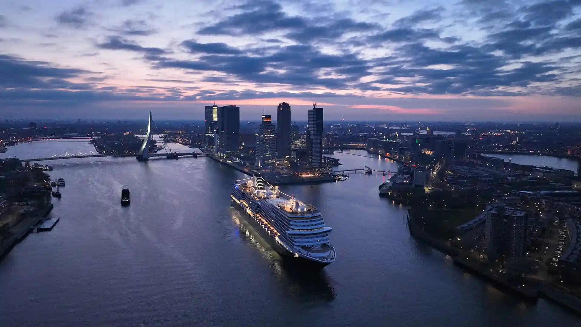 Early morning aerial view of Rotterdam with Holland America Line cruise ship.