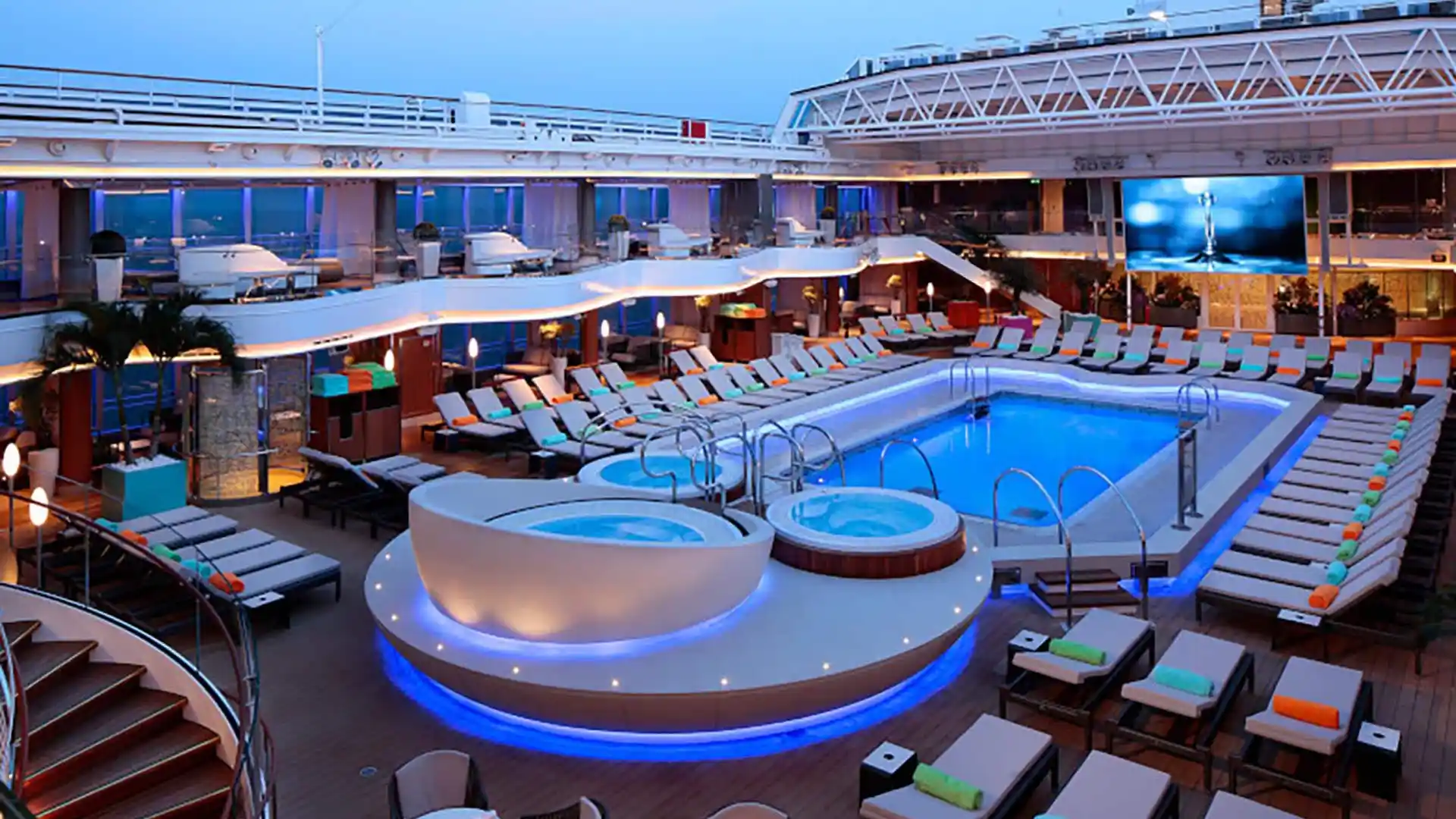 View of pool and lounge chairs on Holland America Line cruise ship.