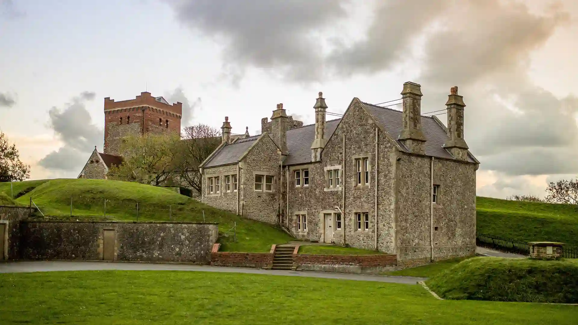 Dover Castle Gray castle on green hill under gray skies.