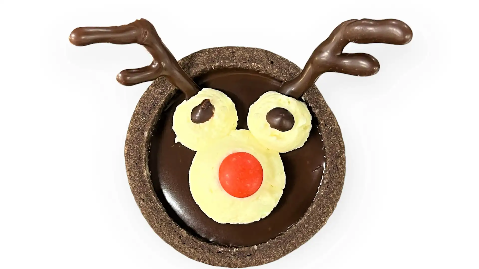 View of Holland America Line tea-time holiday dessert that looks like a reindeer with a red chocolate candy nose.