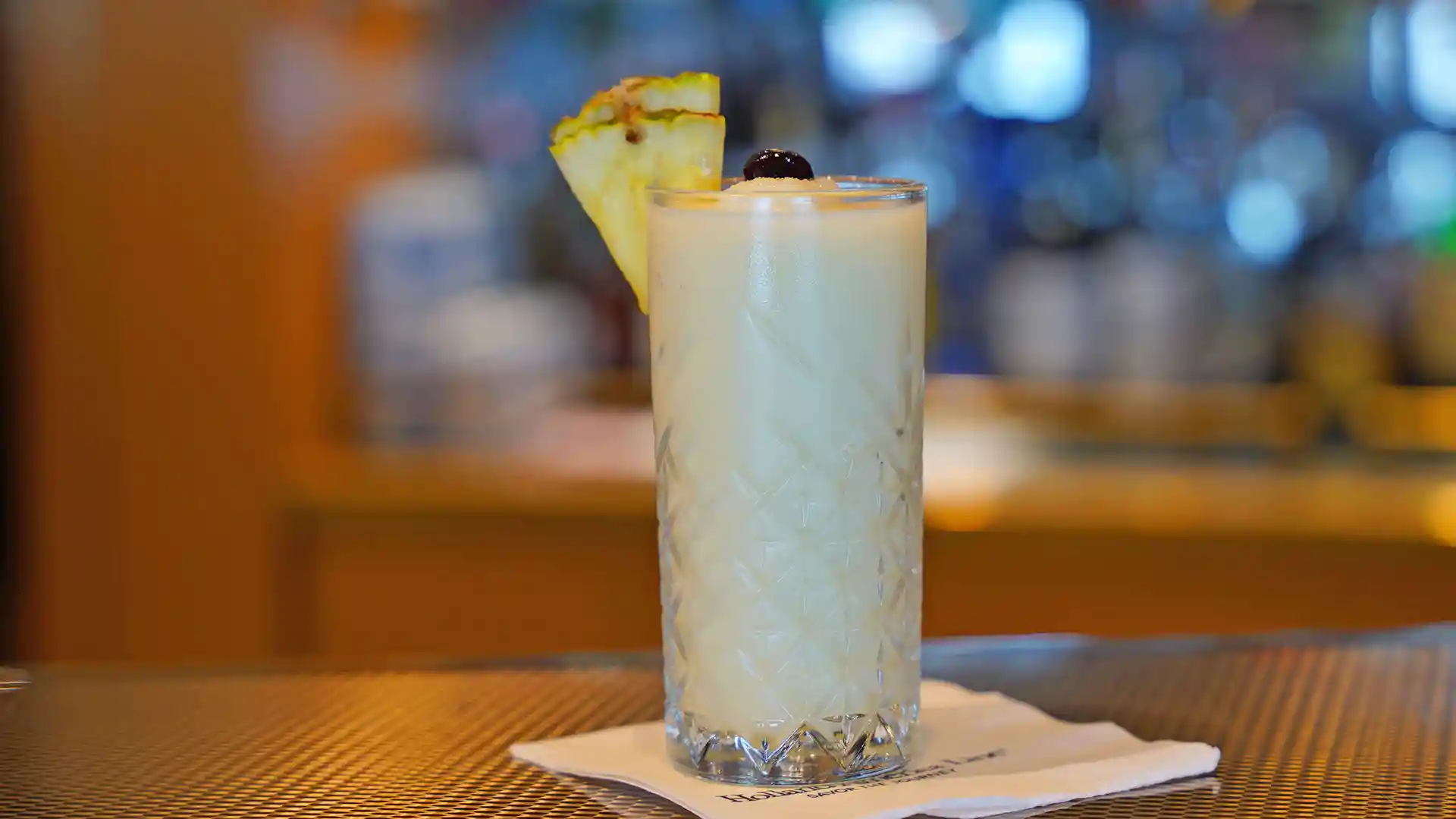 Mocktail in drinking glass with pineapple flavors.