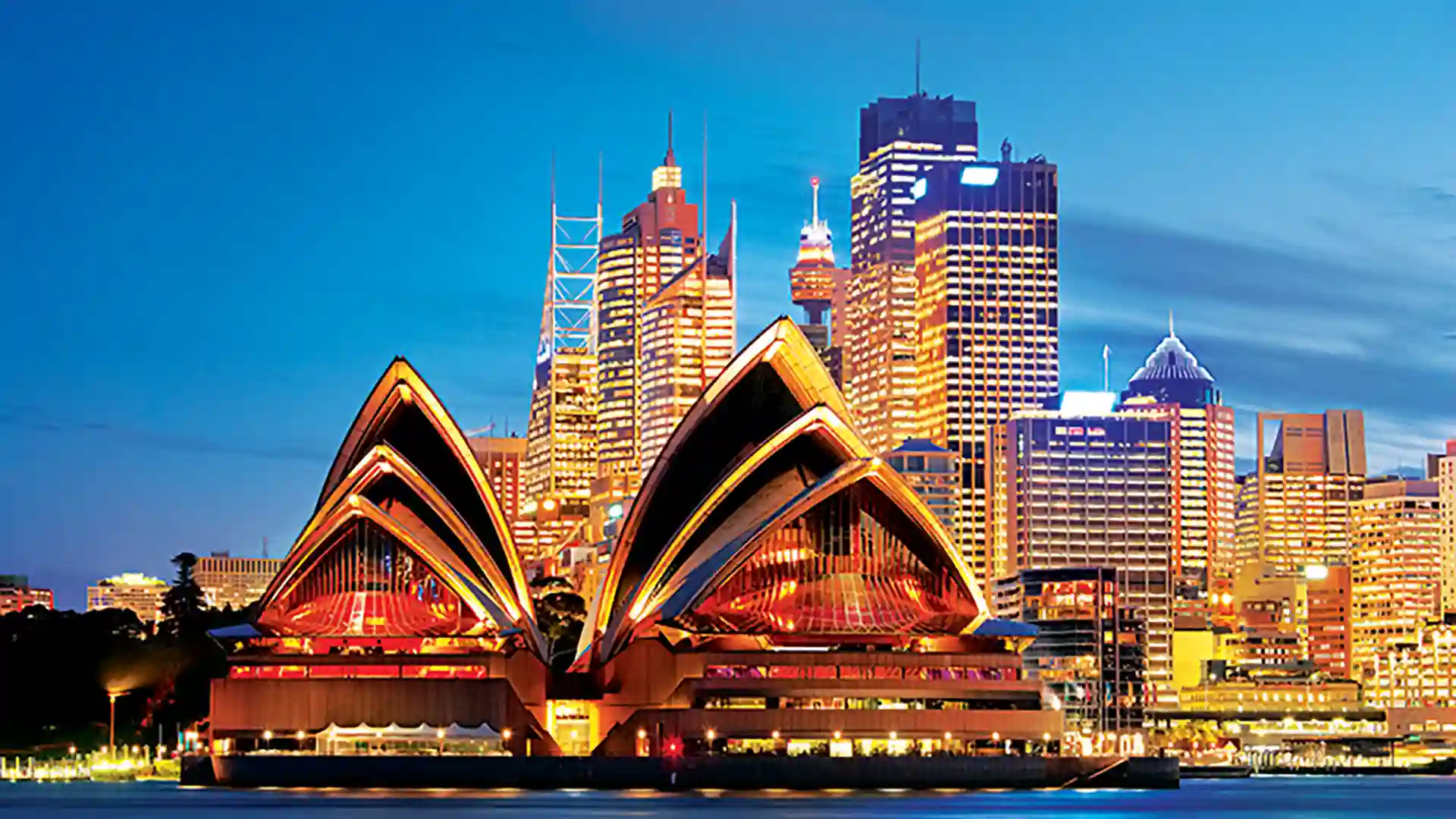 Sydney Opera House in Australia View of Sydney Opera House lit up in lights in Australia.