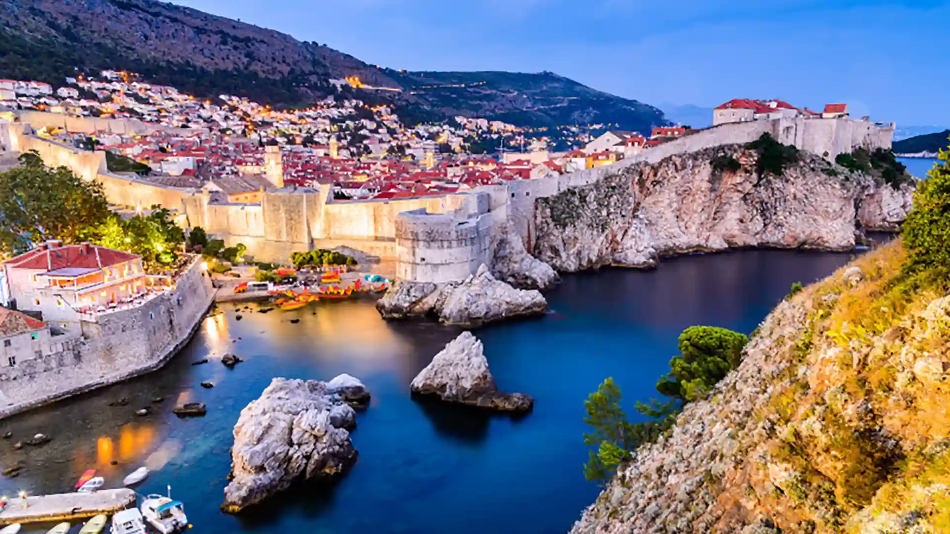 View of city and rocky landscape along coastline in Dubrovnik, Croatia.