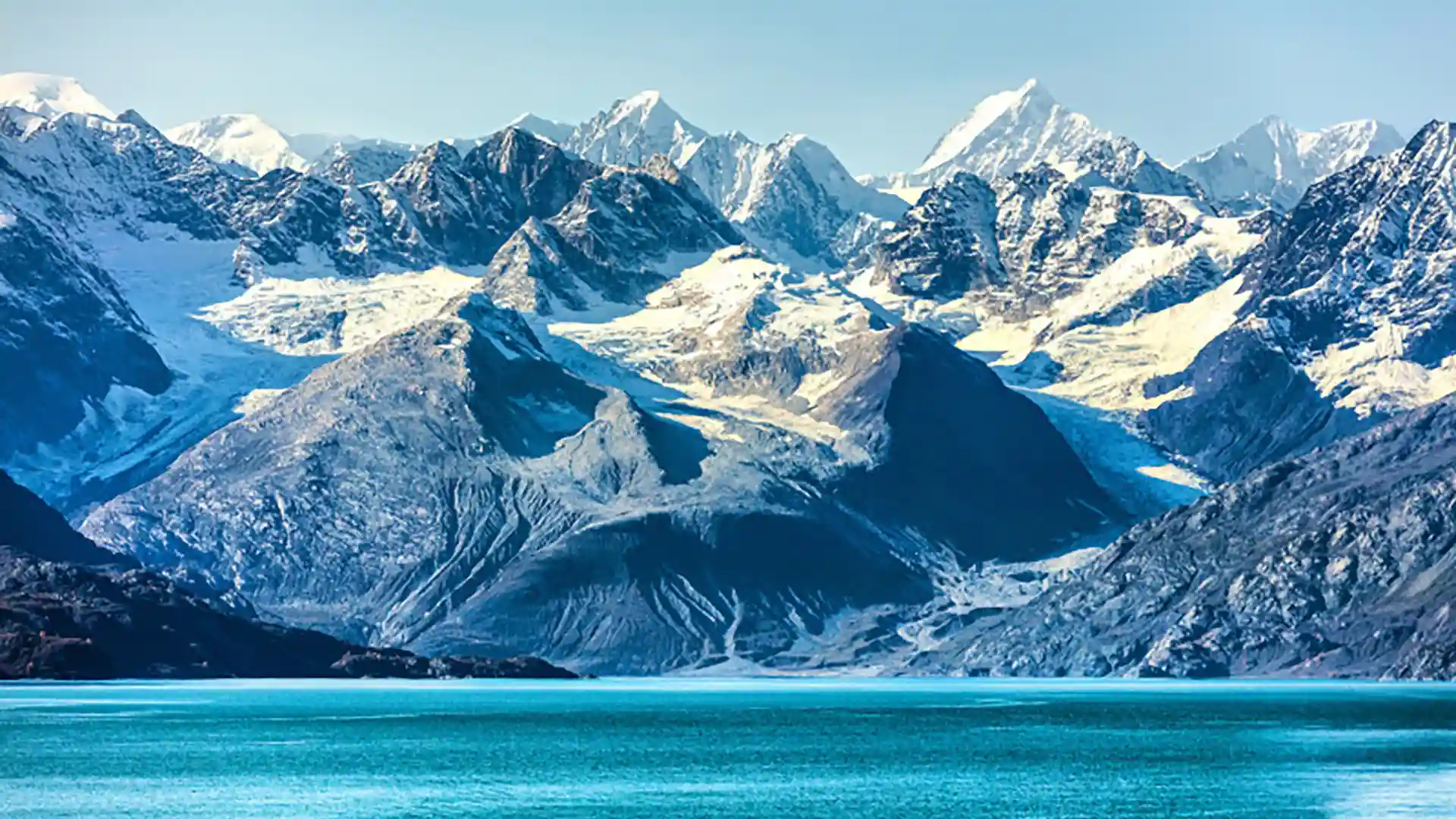 View of snowcapped mountains and glaciers in Glacier Bay National Park, Alaska.