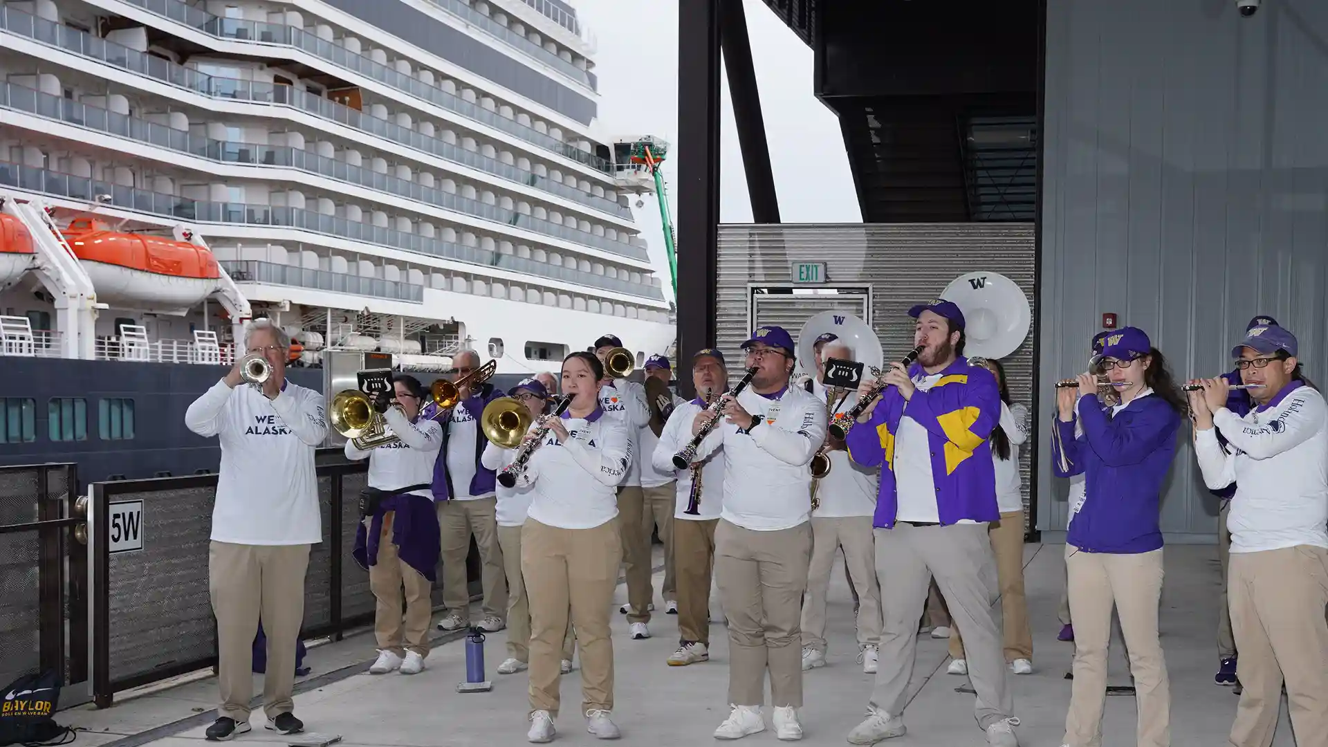 View of University of Washington Alumni Band performing at Holland America Line's Alaska Sailaway event in Seattle.
