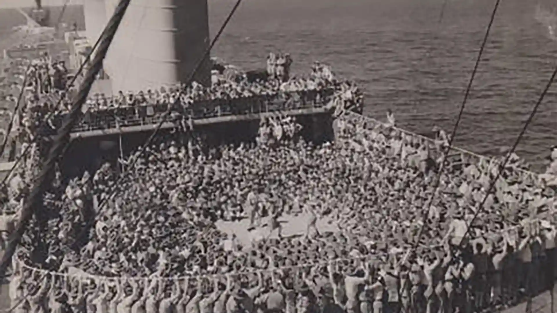 World War II Troopship View of soldiers aboard Holland America Line ship used as a troopship during World War II.