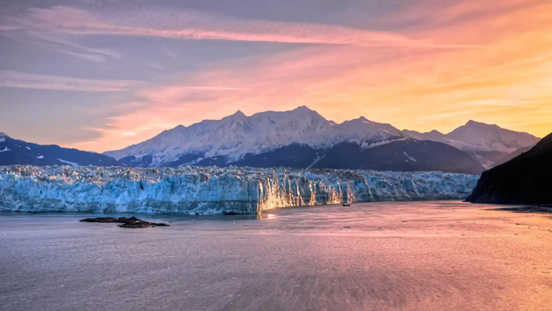 View of Hubbard Glacier in Alaska at sunset.