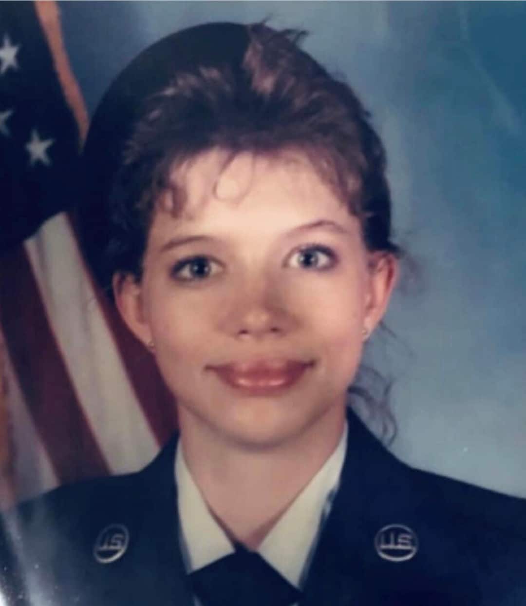 U.S. Air Force Veteran Holland America Line View of person in military uniform with American flag in background.