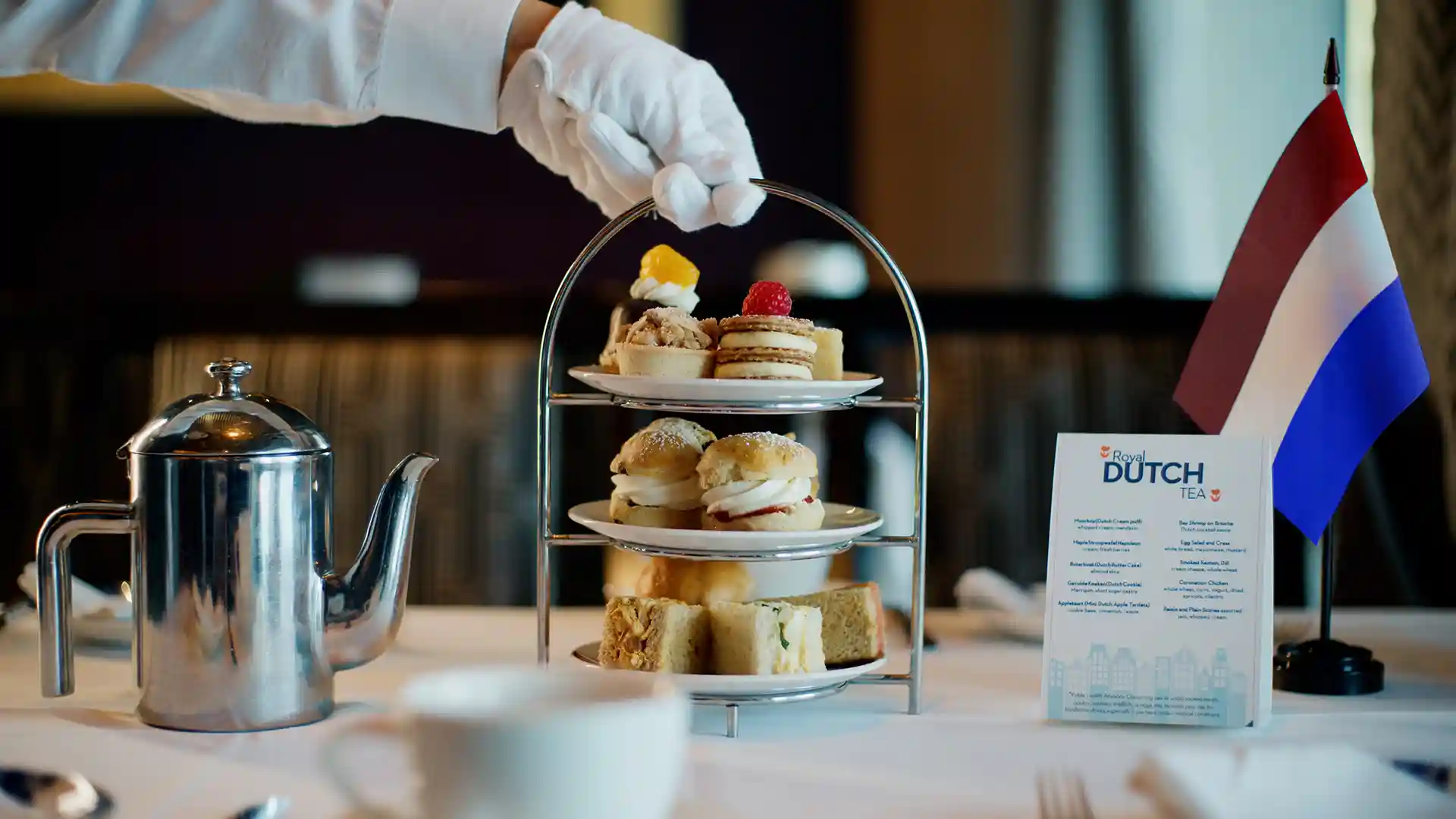 Royal Dutch Tea View of tiered platter for afternoon tea dining.
