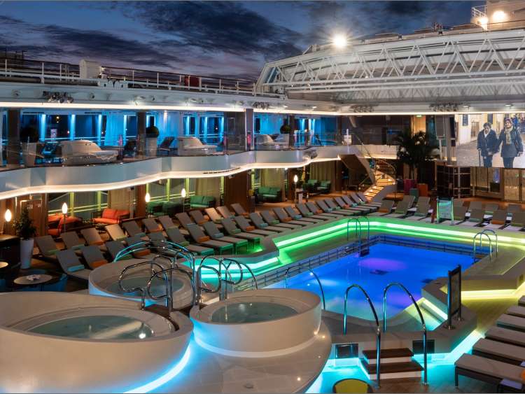 Night view of the Lido pool on a top-deck ship