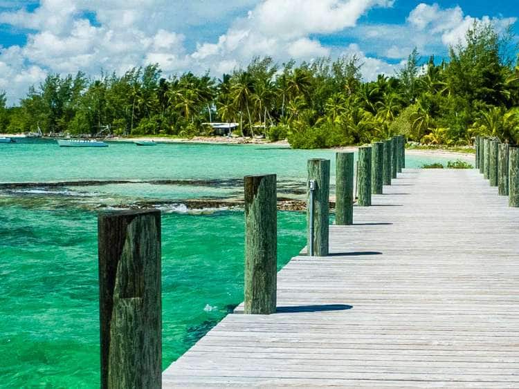Long pier on the blue-green water in the Bahamas