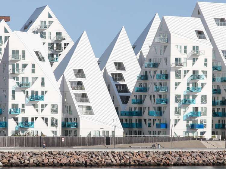 A view of the white houses along Port Arhus in Denmark.