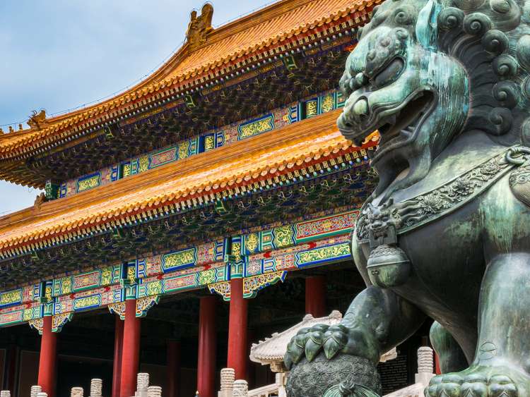A view of a temple and lion statue in Port Xingang Beijing China
