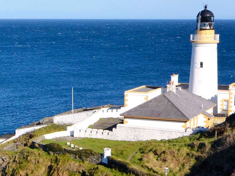 A lighthouse on the coast of Port Douglas on The Isle of Man