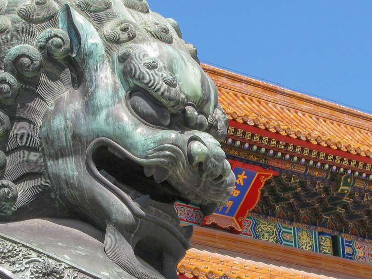 Closed up of the Bronze Guardian Lion statue in Beijing, China