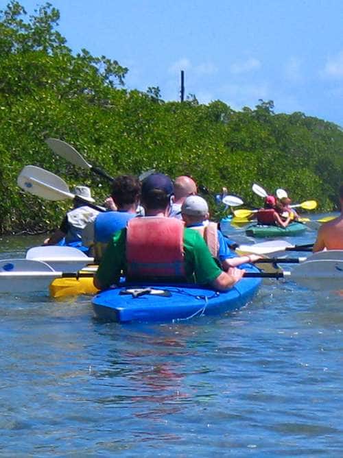Vacationers enjoying a Key West nature kayak adventure while on a cruise to Key West