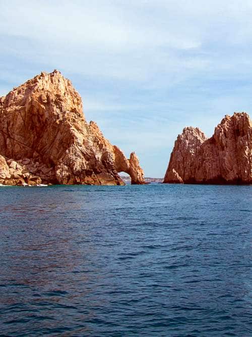 View of a scenic beach from a boat tour on a cruise to Mexico