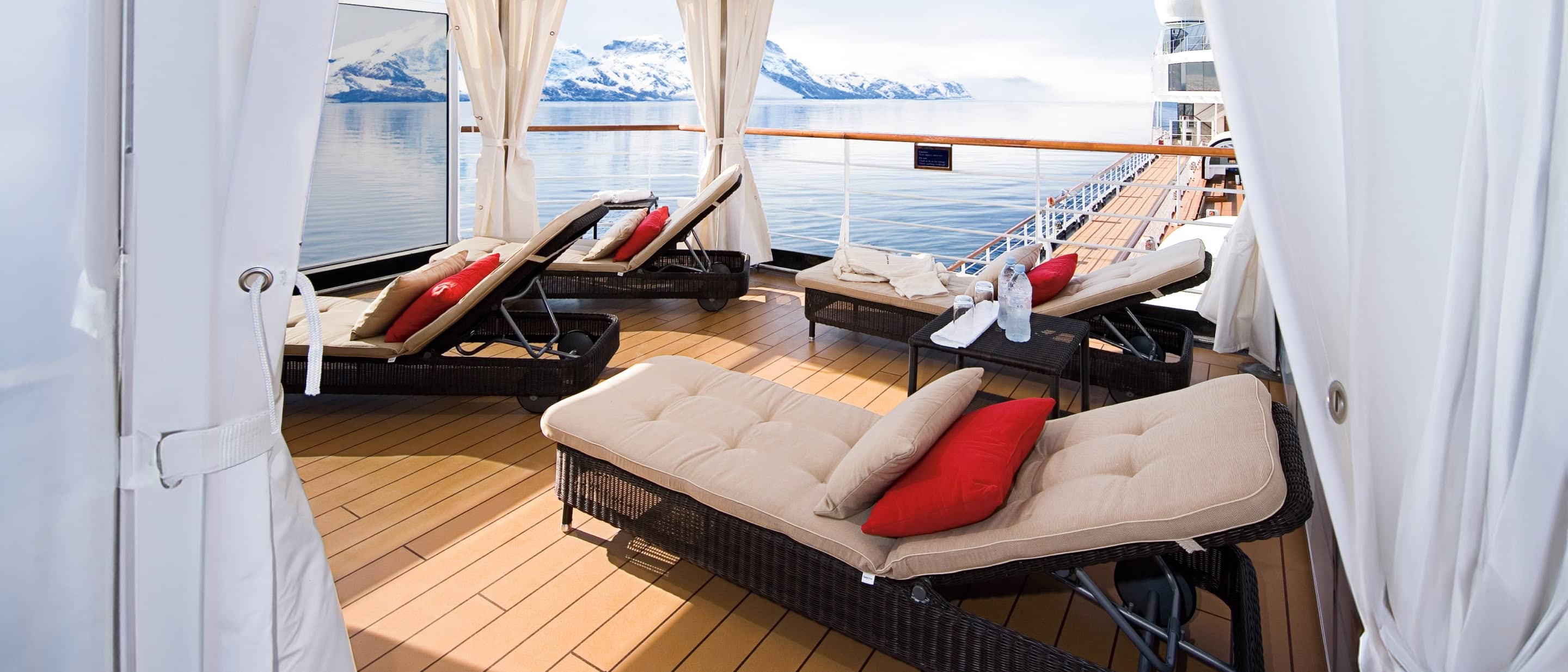 A private cabana with glacier view on a Holland America Line cruise ship.