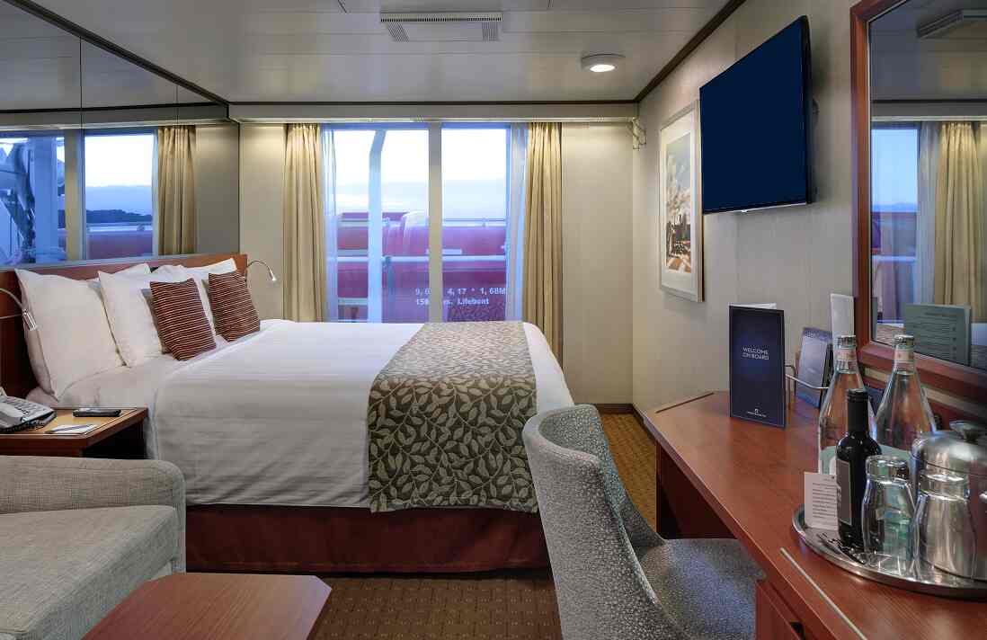 Obstructed Verandah stateroom with partial ocean view on Holland America cruise ship.