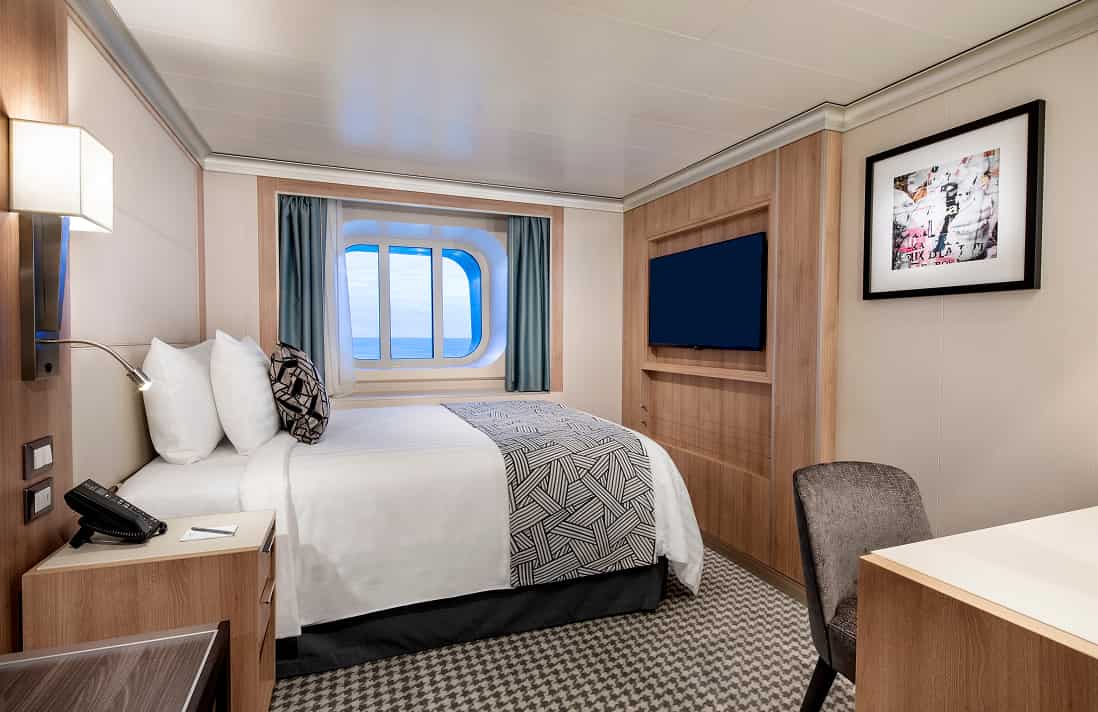 Single stateroom designed for solo travelers on Holland America cruise ship.