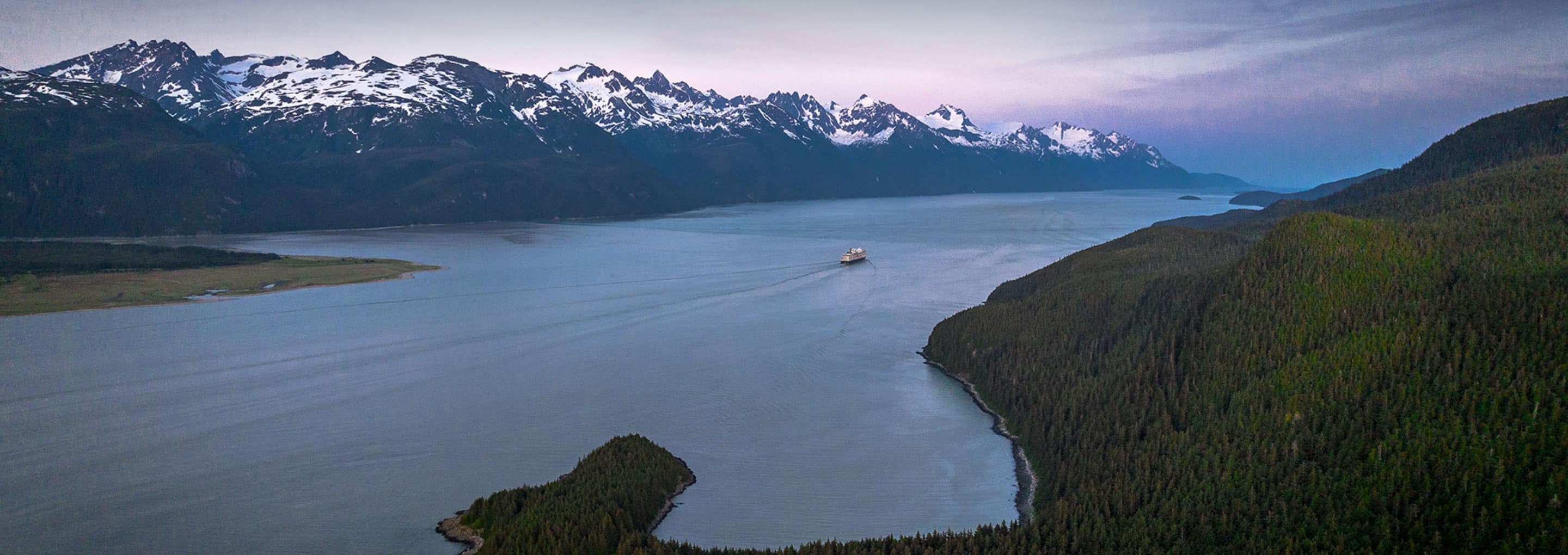 A Holland America cruise ship sails up Alaska's Inside Passage opens a dialog