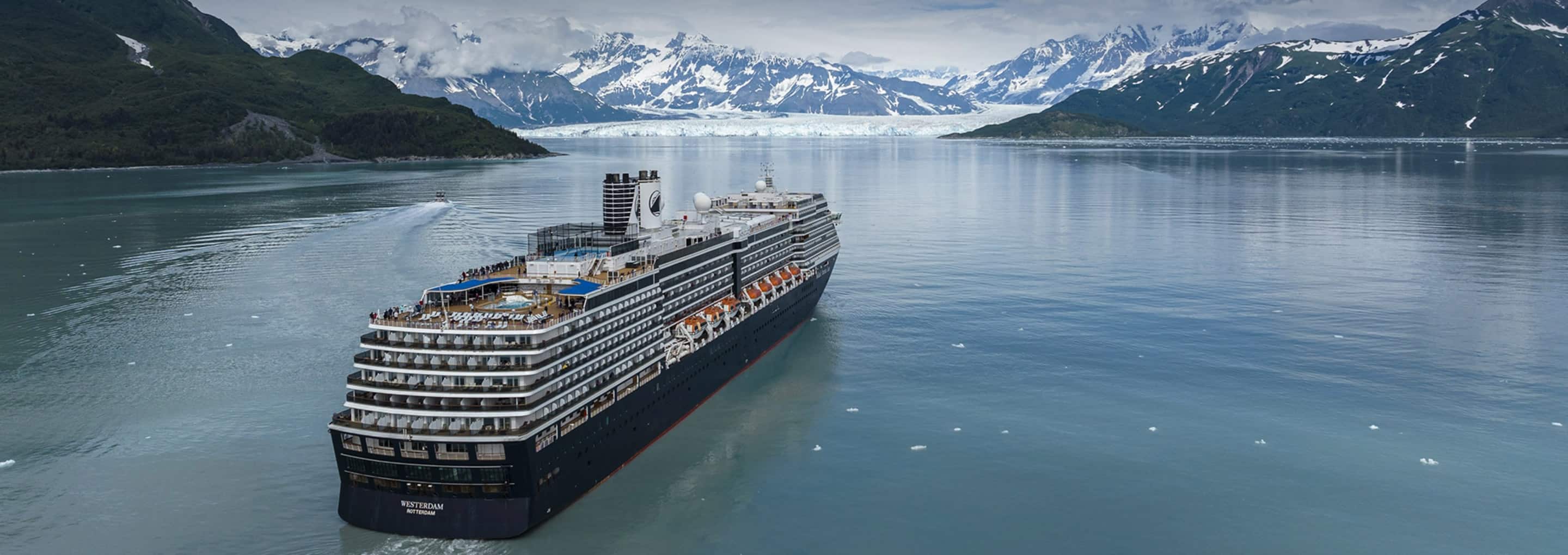 View of a Holland America cruise ship sailing near a glacier in Alaska opens a dialog