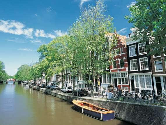 View of the buildings along the Canals of Amsterdam, the Netherlands
