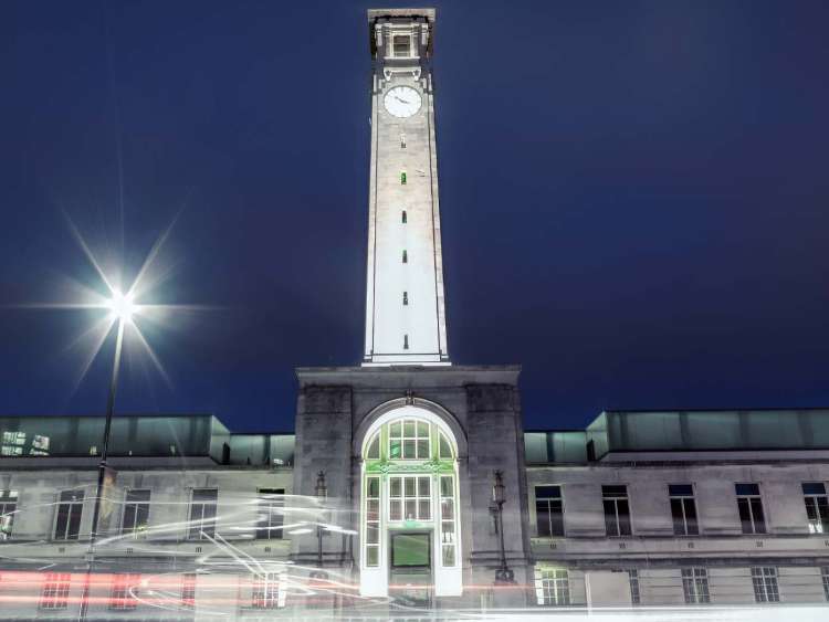 a clock tower at the civic center of southampton, england