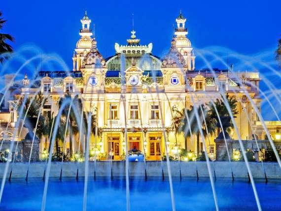 Principality of Monaco, Monte Carlo. Casino at night.