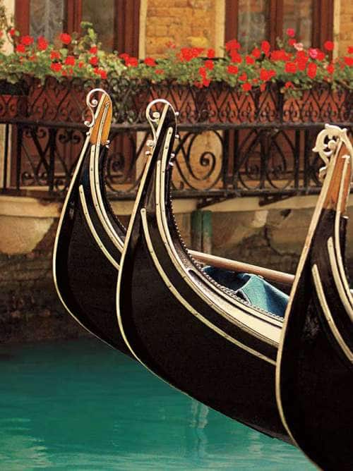 gondolas floating on the canals of venice, italy