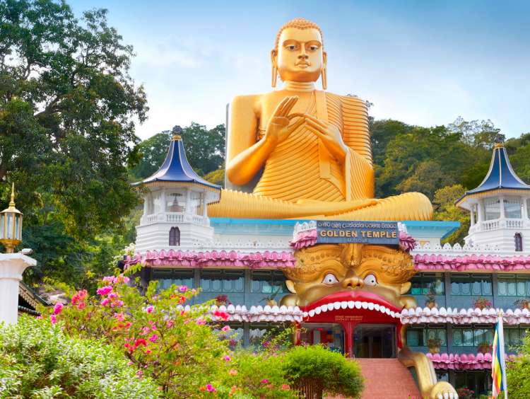 Sri Lanka - Dambulla, Golden Buddha statue over the Buddish Museum, Kandy province, UNESCO World Heritage Site, central region of Sri Lanka Island RM