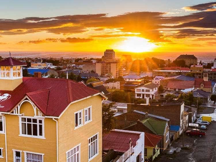 A sunset view of the town of Punta Arenas, Chile on a South America cruise
