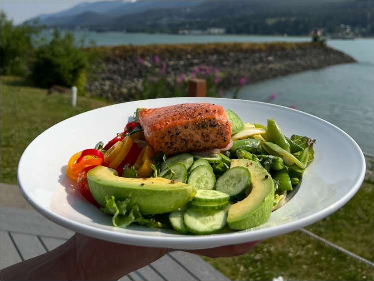 Salmon dish with avocado and cucumbers