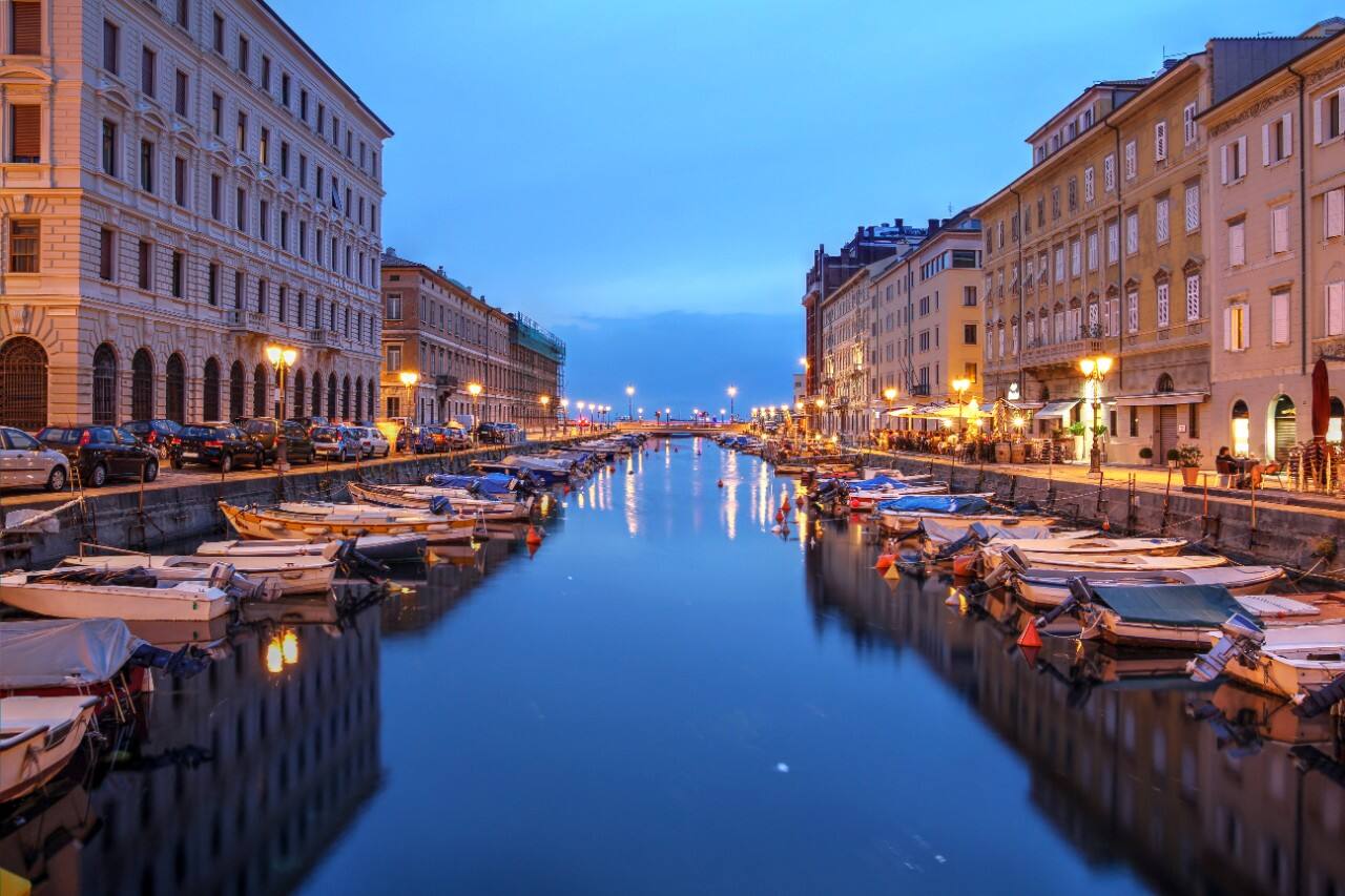 Scenic view of the Canal Grande in Trieste, Italy at night.