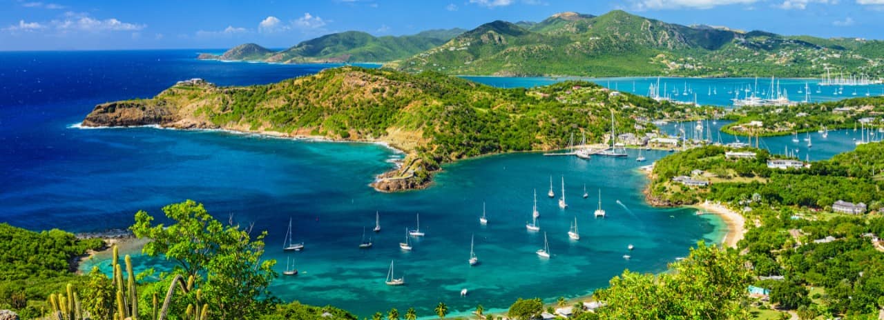 An aerial view of multiple ships in Antigua Bay.
