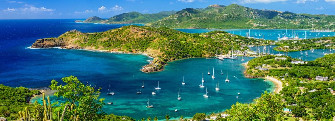 An aerial view of multiple ships in Antigua Bay.