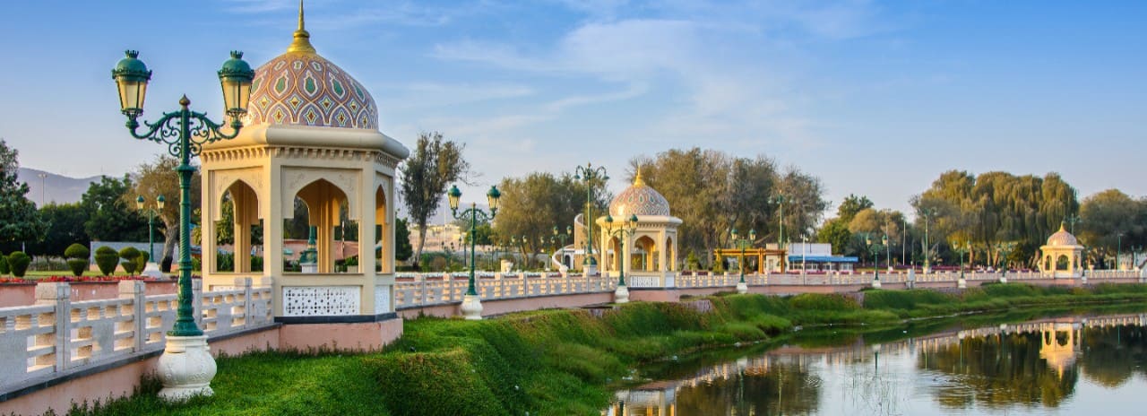 A view of decorated gazebos along the waterfront in Oman.
