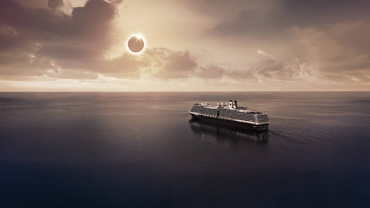 Ship positioned directly in the path of totality of the solar eclipse.