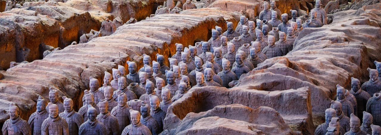 Group of terracotta warrior statues in a excavation site in Xi'an, China.