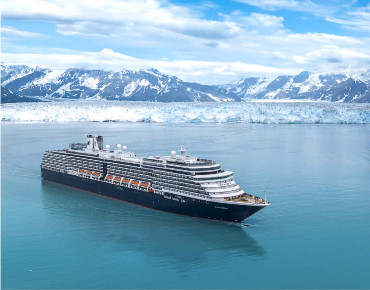 Holland America cruise ship ms Westerdam anchored near a glacier in Alaska
