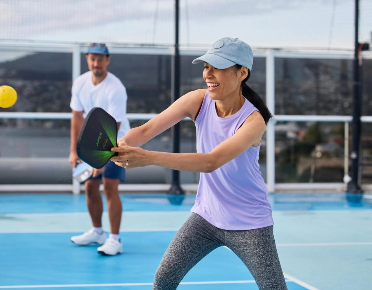 People playing pickleball on ship's top deck