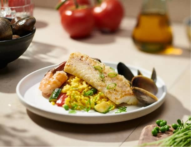 Seared Atlantic Haddock served on a round plate