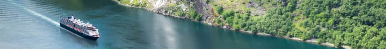 Holland America ship cruising the fjords