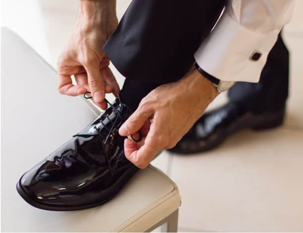 Man tying shoes