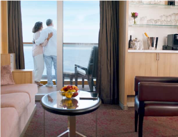 Couple standing on veranda