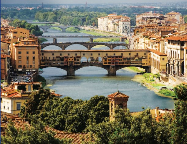 Arched bridges seen in Florence, Italy.