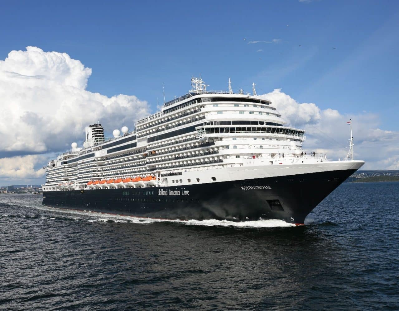 Holland America's Koningsdam cruise ship sails out of port along the Pacific Coast