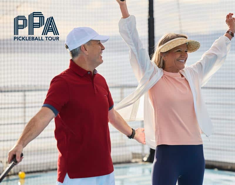 Couple celebrating Pickleball game win